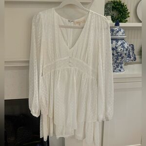 white long sleeved flowy dress